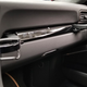Illustration for article titled The Needlessly Complicated Cupholders in the Porsche 911 Are Awesome